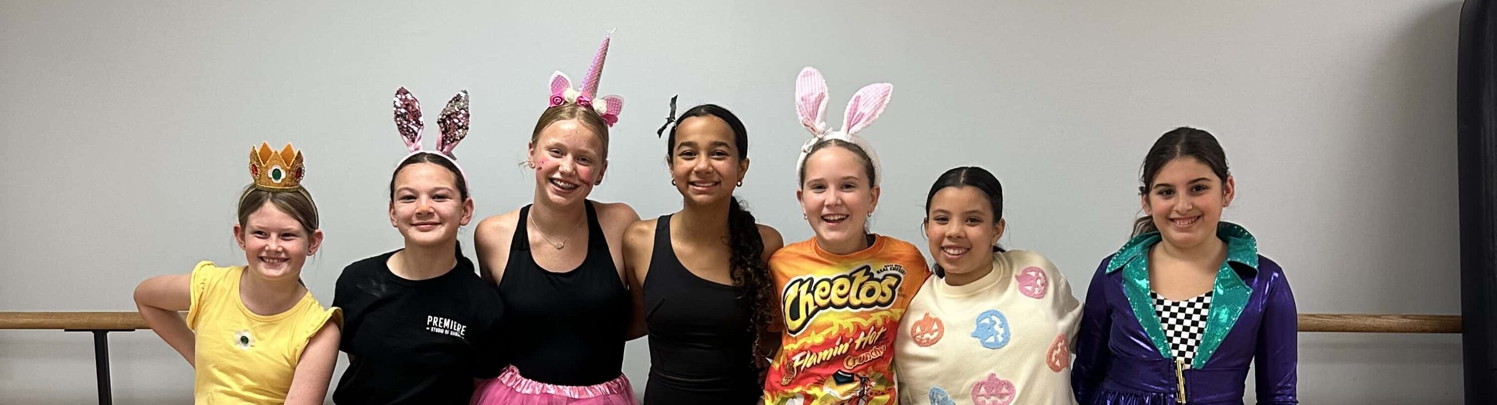 Dancers in their halloween costumes during Bring a Friend Week